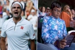 Indian origin boy reading book in Wimbledon 2019 Clash of Tennis, Roger Federer Vs Rafael Nadal Semi-Final, roger federer vs rafael nadal semi final indian origin boy seen engrossed in his book during wimbledon 2019 clash of tennis, Rafael