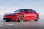 Tesla new electric car breaking updates, Tesla new electric car breaking news, tesla to launch electric hatchback without a steering wheel, Hatchback