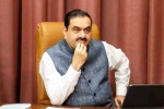 Gautam Adani in trouble, Gautam Adani news, billionaire gautam adani charged in us with usd 250 million bribery, Stocks